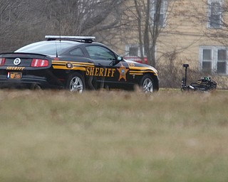        ROBERT K. YOSAY  | THE VINDICATOR..Robot as it makes its way to the house ..GOSHEN Ñ Mahoning County Sheriff Jerry Greene said a suspect is dead from "apparent suicide" after shots were fired as deputies tried to serve a civil order of protection at about 11:20 a.m... .-30-