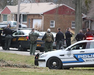        ROBERT K. YOSAY  | THE VINDICATOR..GOSHEN Ñ Mahoning County Sheriff Jerry Greene said a suspect is dead from "apparent suicide" after shots were fired as deputies tried to serve a civil order of protection at about 11:20 a.m... .-30-