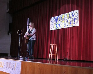 Neighbors | Alexis Bartolomucci.Katy Collins performed a concert for the students at St. Christine School on Jan. 31.