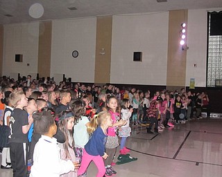 Neighbors | Alexis Bartolomucci.Students at St. Christine got up to dance along with Katy Collins during her performance on Jan. 31.