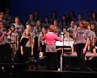 Neighbors | Abby Slanker.Two Canfield High School choral students performed a duet to the song “The Look of Love” during the Canfield Choral Boosters ‘Blast From The Past’ Dinner Theater on Jan. 28.