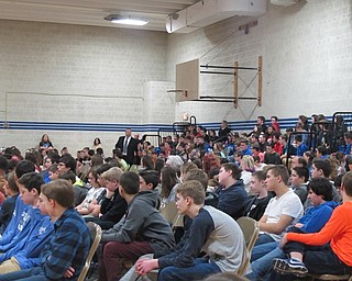 Neighbors | Alexis Bartolomucci.Mahoning County Juvenile Court Program Coordinator James DeLucia walked around as he spoke to the students at Poland Middle School on Feb. 2.
