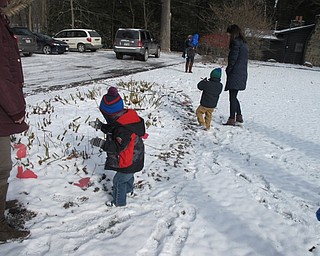 Neighbors | Alexis Bartolomucci.Children at the Tales for Tots program at Mill Creek MetroParks looked for rabbits in the yard during the Eastern Cottontail program on Feb. 10.