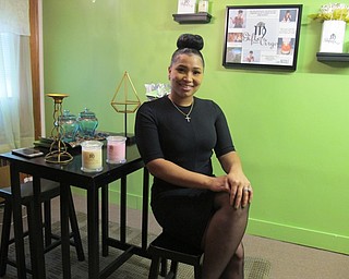 Neighbors | Alexis Bartolomucci.Kristin Scott-Biggs is the owner of Gifts From a Virgo in Boardman and creates her own candles and soy melts.