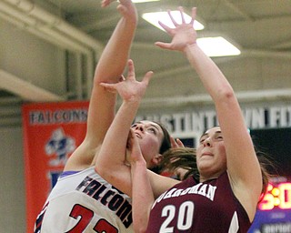 William D Lewis The Vindictor Fitch's NAtalie Lynn(22) and Boardman's Lauren Gabriele(20) go for the ball during 2-23-17 action at Fitch.