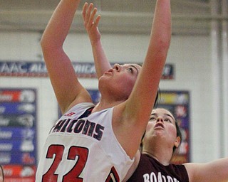 William D Lewis The Vindictor Fitch's Camryn Constance(14) pulls down a rebound past Boardman'sLauren Pavlansky(14) during 2-23-17 action at Fitch.