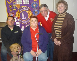 SPECIAL TO THE VINDICATOR
Austintown Lions Club hosted its monthly meeting Feb. 13 at Austintown Community Church. Harold Wilson, acting King Lion, presided. Special guests, from left, were Mark Hart, a transfer member; Linda and Dave Martin, members of Canfield Lions; and Carol Majestic, a new member. Jake, a service dog in training, was taken to the meeting by Tom Zickefoose, past district governor of the club. The club discussed their 5-K run set for May 13 and the 2017 District and State conventions. For information on joining Austintown Lions, email Bob Whited at olebert1@aol.com, or call 330-792-7907.