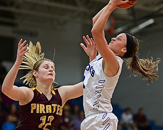 POLAND, OHIO - FEBRUARY 23, 2017: Sarah Bury #2 of Poland grabs a rebound away from Danielle Norquest #12 of Southeast during the second half of their game Thursday night at Poland High School. Southeast won 72-71. DAVID DERMER | THE VINDICATOR
