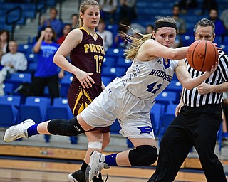 POLAND, OHIO - FEBRUARY 23, 2017: Emily Melnek #42 of Poland goes air borne to prevent the ball from going out of bounds during the second half of their game Thursday night at Poland High School. Southeast won 72-71. DAVID DERMER | THE VINDICATOR..Danielle Norquest #12 of Southeast pictured.