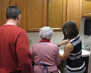 Neighbors | Alexis Bartolomucci.Mary Nicolli showed Mike Case and Christa Lamendola how to make her biscotti on Feb. 7 at the Commons at Greenbriar.