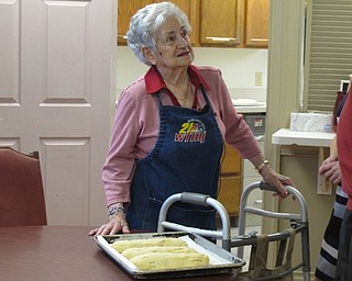 Neighbors | Alexis Bartolomucci.Mary Nicolli stood with her freshly baked biscotti during her interview with WFMJ on Feb. 7 at the Commons at Greenbriar.