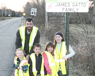 SPECIAL TO THE VINDICATOR
The Gatto family adopted Berlin Station Road as part of the Berlin Township cleanup. They regularly pick up the litter. The family includes James Gatto and children Grayson, left, James, Gracie and Madison. His wife and their mother, Malissa Gatto, also participates. Denny Furman, Berlin Township trustee, recently organized the township cleanup with the Mahoning County Green Team.

