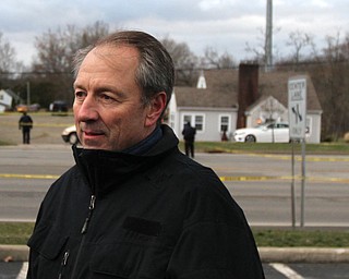 Trumbull County Paul Monroe talks with members of the media across the street from the crime scene. A shooting occurred just after 4:00 p.m. at a house on the 1500 block on Niles-Cortland Road, State Route 46, in Howland, Saturday, Feb. 25, 2017 in Howland. One subject died at the scene, another at the hospital later on, three others remain in the hospital...(Nikos Frazier | The Vindicator)..