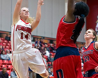MICHAEL G TAYLOR | THE VINDICATOR- 02-25-17  -Women's  Basketball-  2nd qtr., YSU's #14 Melinda Trimme shoots over Detroit Mercy's #23 Brianne Cohen. Detroit Mercy Titans vs YSU Penguins at YSU, Beeghly Center in Youngstown, OH
