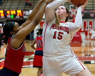 MICHAEL G TAYLOR | THE VINDICATOR- 02-25-17  -Women's  Basketball-  2nd qtr., YSU's #15 Mary Dunn shoots over Detroit Mercy's #32 Kelsey Mitchell.  Detroit Mercy Titans vs YSU Penguins at YSU, Beeghly Center in Youngstown, OH