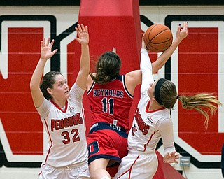 MICHAEL G TAYLOR | THE VINDICATOR- 02-25-17  -Women's  Basketball- 3rd qtr., YSU's #2 Alison Smolinski and YSU's #32 Jenna Hirsch stop the drive of Detroit Mercy's #11 Rosanna Reynolds. Detroit Mercy Titans vs YSU Penguins at YSU, Beeghly Center in Youngstown, OH