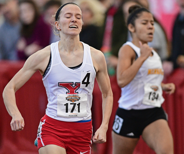 YOUNGSTOWN, OHIO - FEBRUARY 26, 2017: Iva Domitrovich of YSU sprints to the finish line ahead of Briana Mitchell of Wisconsin-Milwaukee during the first heat of the women's 400m dash during the Horizon League Championship track meet, Sunday afternoon at Youngstown State. DAVID DERMER | THE VINDICATOR