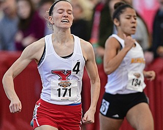 YOUNGSTOWN, OHIO - FEBRUARY 26, 2017: Iva Domitrovich of YSU sprints to the finish line ahead of Briana Mitchell of Wisconsin-Milwaukee during the first heat of the women's 400m dash during the Horizon League Championship track meet, Sunday afternoon at Youngstown State. DAVID DERMER | THE VINDICATOR