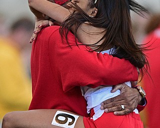 YOUNGSTOWN, OHIO - FEBRUARY 26, 2017: Taylor Thompkins gets a hug from her father Eric Thompkins, of Canton after she finished first in the women's 60m dash during the Horizon League Championship track meet, Sunday afternoon at Youngstown State. DAVID DERMER | THE VINDICATOR