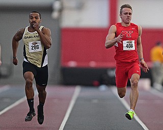 YOUNGSTOWN, OHIO - FEBRUARY 26, 2017: Chad Zallow of YSU sprints to the finish line to finish first ahead of Aaron Davis of Oakland and Josh Beaumont and Brendan Lucas of YSU during the men's 200m dash during the Horizon League Championship track meet, Sunday afternoon at Youngstown State. DAVID DERMER | THE VINDICATOR