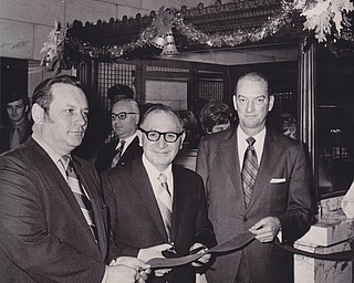 A 43 foot passageway connecting Strouss' with the Union National Bank was opened this morning when officials joined Mayor A. B. Flask (center)