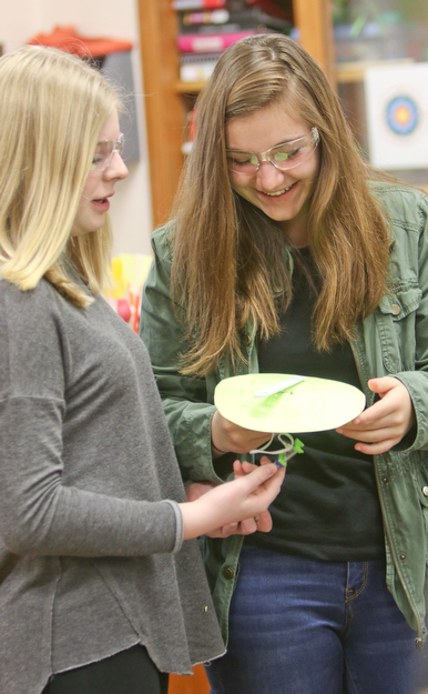        ROBERT K. YOSAY  | THE VINDICATOR..Lauren Minehart  and Gabbie Seifert work on a moving game piece..a grant from the Poland schools foundation, a middle school program has some new materials for STEAM -- science, technology, engineering, arts, mathetmatics ÐÐ programs.. .-30-