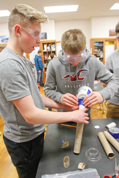        ROBERT K. YOSAY  | THE VINDICATOR..working on their second project of the day 8th graders- Mason Matiste and Jack Arnett.... work on a  producing a game..a grant from the Poland schools foundation, a middle school program has some new materials for STEAM -- science, technology, engineering, arts, mathetmatics ÐÐ programs.. .-30-