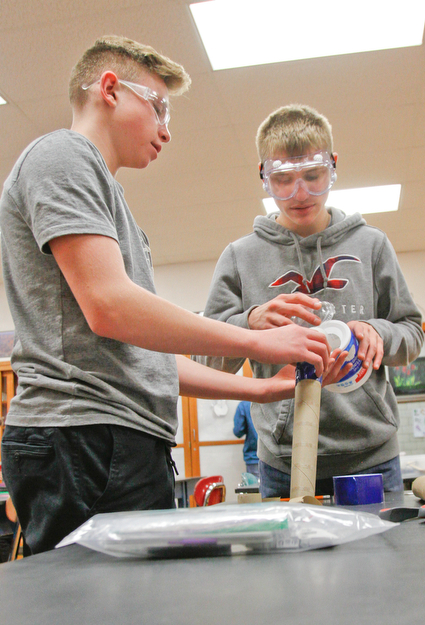        ROBERT K. YOSAY  | THE VINDICATOR..working on their second project of the day 8th graders- Mason Matiste and Jack Arnett.... work on a  producing a game..a grant from the Poland schools foundation, a middle school program has some new materials for STEAM -- science, technology, engineering, arts, mathetmatics ÐÐ programs.. .-30-
