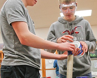       ROBERT K. YOSAY  | THE VINDICATOR..working on their second project of the day 8th graders- Mason Matiste and Jack Arnett.... work on a  producing a game..a grant from the Poland schools foundation, a middle school program has some new materials for STEAM -- science, technology, engineering, arts, mathetmatics ÐÐ programs.. .-30-