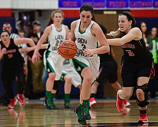 AUSTINTOWN, OHIO - FEBRUARY 27, 2017: Brenna Rito #3 of West Branch dribbles away from Karli Shives #5 of Struthers during the second half of their game Monday night at Austintown Fitch High School. DAVID DERMER | THE VINDICATOR