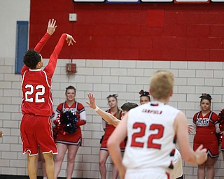 Niles sophomore guard Corbin Foy(22) goes up for three during the 3rd quarter as Niles McKinley takes on Canfield, Tuesday, Feb. 28, 2017 at Canfield High School. Canfield won 70-42...(Nikos Frazier | The Vindicator)..