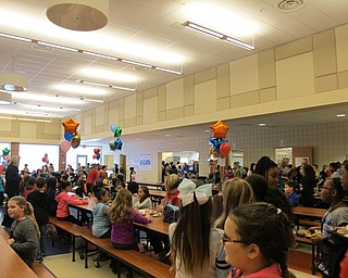 Neighbors | Alexis Bartolomucci.The Austintown Intermediate School lunchroom was filled with students who sat next to new friends during the No One Eats Alone day on Feb. 10.