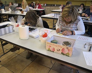 Neighbors | Alexis Bartolomucci.Guests decorated cookies at Fellows Riverside Gardens on Feb. 11 during the cookie decorating program.