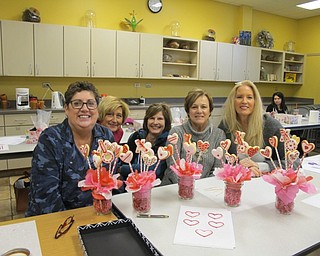 Neighbors | Alexis Bartolomucci.Long-time friends made Valentine's Day cookie bouquets on Feb. 11 at Fellows Riverside Gardens. Pictured are, from left, Tammy, Sandy, Michele, Stephanie and Twila.