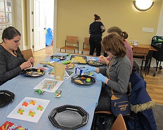 Neighbors | Alexis Bartolomucci.Guests at the candy sushi event at the Poland library on Feb. 9 made sushi using different types of candy.