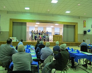 Neighbors | Alexis Bartolomucci.Members of the Poland Rotary watched second-grade students perform different songs for them during their meeting at Poland Union on Feb. 8.