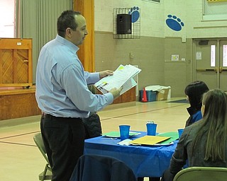 Neighbors | Alexis Bartolomucci.Todd Bury of the Poland Rotary read some of the thank you letters the second-grade students at Poland Union wrote to the Rotary on Feb. 8.