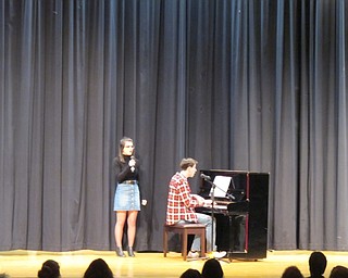 Neighbors | Alexis Bartolomucci.Poland Seminary High School students performed a song together during the talent show on Feb. 6.