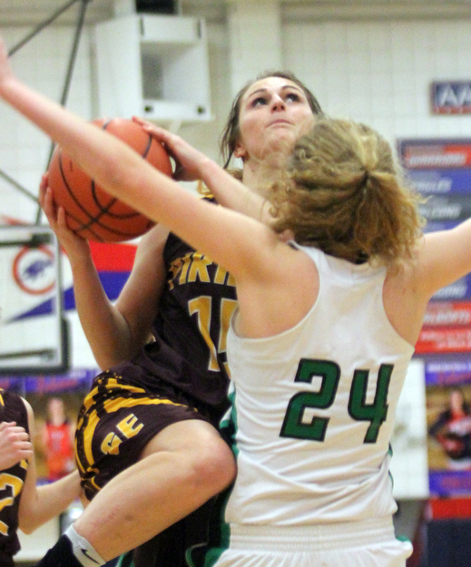 William D. Lewis The Vindicator South East's Riley Norquest(15) tries to shoot past West Branch's Sarrah Tennefoss(24) during 3-2-17 action at Fitch.
