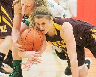 William D. Lewis The Vindicator  Westbranch's Kyla Hovorka(23) and South East's Danielle Norquest(12) go for a loose ball during 3-2-17 action at Fitch.