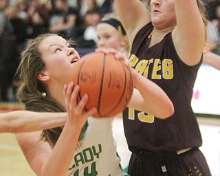 William D. Lewis The Vindicator  Westbranch's Kyla Hovorka(23Hannah Ridgway(14) shoots past Southeasts Riley Norquest(15)during 3-2-17 action at Fitch.