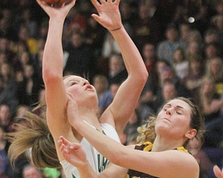 William D. Lewis The Vindicator  Westbranch'sHannah ridgway(14) shoots past South East's RileyNorquest(15)  during 3-2-17 action at Fitch.