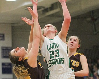 William D. Lewis The Vindicator  Westbranch's Kyla Hovorka(23) shoots past  South East's DRiley Norquest(15) and Hannah Schill(22) during 3-2-17 action at Fitch.
