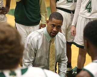 Ursuline head coach Keith Gunther talks to his players before the 2nd quarter as Cardinal Mooney takes on Ursuline, Friday, March 3, 2017 at Ursuline High School. Ursuline won 39-37...(Nikos Frazier | The Vindicator)..