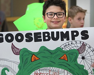 Fourth-grader Tyler Hobart participates in a parade at Struthers Elementary School.