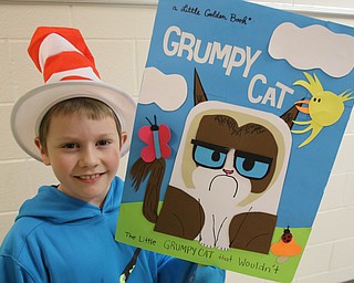 Rowan Hetrick, Struther's Elementary School third-grader with his Grumpy Cat poster.