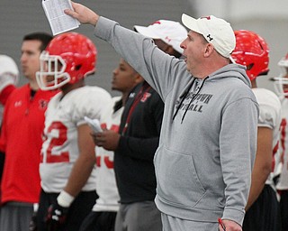 William D Lewis the Vindicator YSU head coach Bo Pelini during 3-3-17 practice at WATTS Center.