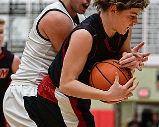 STRUTHERS, OHIO - MARCH 3, 2017: Josh Young #3 of Salem rips the ball from the grasp of AJ Mussolino #10 of Struthers during the second half of their game Friday night at Struthers High School. DAVID DERMER | THE VINDICATOR