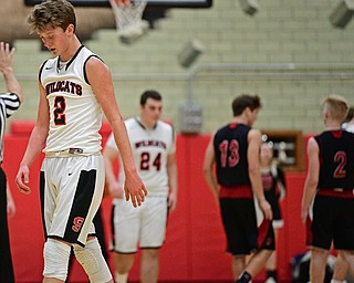 STRUTHERS, OHIO - MARCH 3, 2017: Carson Ryan #2 of Struthers walks to the bench after fouling out of the game late in the fourth quarter of their game Friday night at Struthers High School. DAVID DERMER | THE VINDICATOR