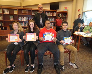 Girard Board of Education recently presented several awards to Girard staff and students for excellence and service. High school students who received February awards, top from left, are Kacie Spina and Jamie Kagy, juniors, who earned service awards; and Anthony Pratt, sophomore, and Anthony Costarella, junior, who earned citizenship awards. Principal William Ryser, behind the students, presented the awards. Junior high students, below from left, are Jorjia Mechling, seventh grade, principal’s award; Jason Seidler, eighth grade, citizenship award; James Manderville, seventh grade, improvement award; Rachel Foreback, eighth grade, service award; and Zain Yarber, eighth grade, certificate of scholarship. At the bottom, Nick Cochran, athletic director, center, honored Dave Leo, left, golf, and Keith Brown, cross country, for winning county coach of the year awards in their respective sports. SPECIAL TO THE VINDICATOR